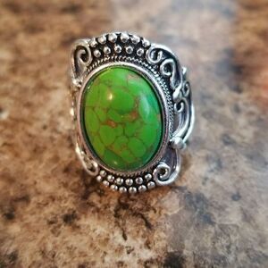 Inlaid turquoise egg shape carved ring size 8